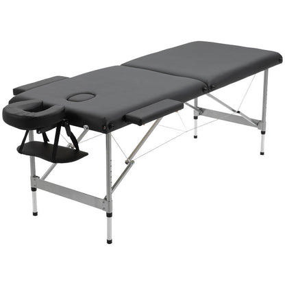 Portable Massage Table Featuring a Face Hole, Arm Supports, Hand Rests, And Dimensions of 186 Cm X 71 Cm X 83 Cm.