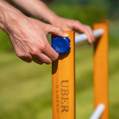 Uber Games Ladder Golfspeelset, hoogwaardig ladder-tuinspel van rubberhout, 12 bolas-ballen van echt goud, draagtas en opbergtas van zeildoek