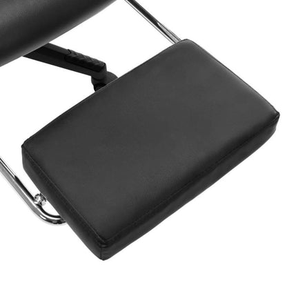 Gaming chair with footrest, black faux leather and gold-colored gaming PC