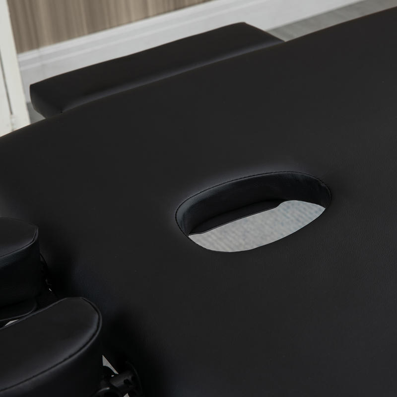 Portable Massage Table Featuring a Face Hole, Arm Supports, Hand Rests, And Dimensions of 186 Cm X 71 Cm X 83 Cm.