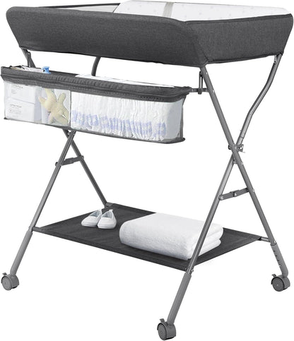 Maydolly Opvouwbare babycommode, mobiele commode met wielen en aankleedkussen, waterdichte en in hoogte verstelbare opbergvakken (donkergrijs