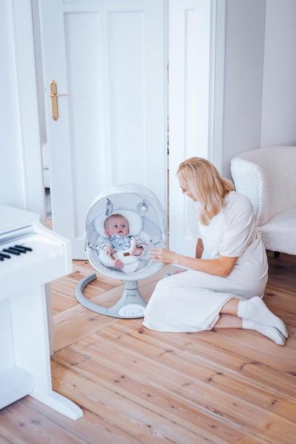MOMI KENANI Rocking Chair for Children up to 9 kg Weight Foldable with Remote Control and Bluetooth for Connecting to Smartphone, Batteries and Mains with 5-Point Safety Belt - QUORE