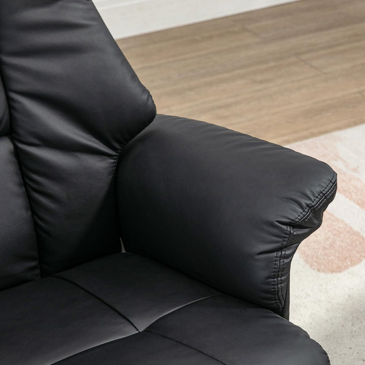 HOMCOM Recliner Chair with Footstool, TV Chair, Upholstered Chair, TV Chair with Reclining Function, 130° Tilting for Living Room, Recreation Room, Black Faux Leather, 77 x 89 x 110 cm. - QUORE