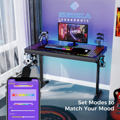 EUREKA ERGONOMIC Glazen gamingtafel met RGB 110 x 60 cm gaming bureau glas gamer PC computertafel met muzieksynchronisatie, app-bediening, hoofdtelefoonhaak, bekerhouder