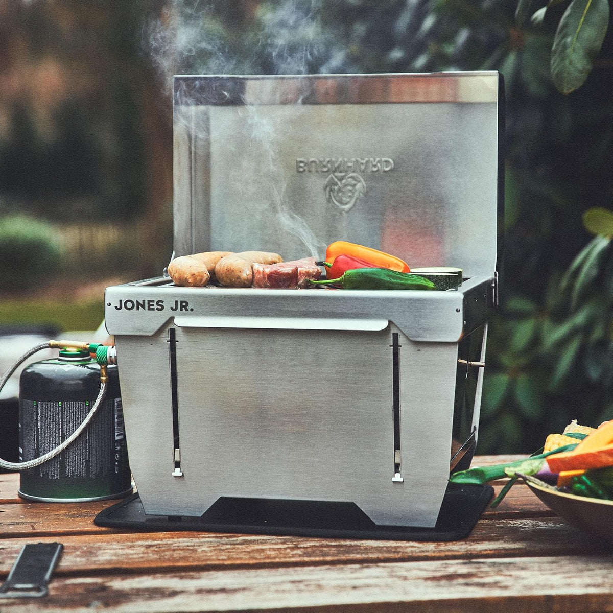 Campinggrill 1-pits BURNHARD® 3,2 kW, 500°C roestvrij staal, FitnFire™-systeem, ultracompact, draagtas, grillmat – JONES Jr.