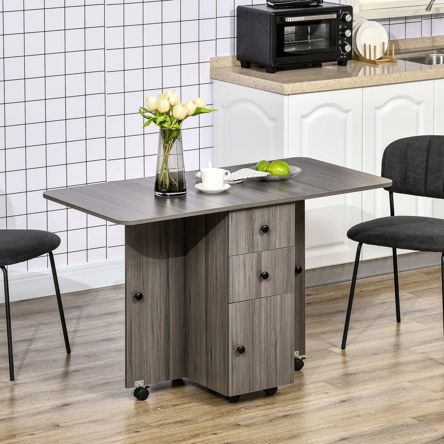 Opvouwbare Keukentafel – Uitschuifbare Eettafel – Inklapbare Tafel – Trolley Tafel – Werktafel – Met 2 Opvouwbare Bladen – Voorzien Van 2 Laden En 1 Kast – Donkergrijs – Compact En Ruimtebesparend – Afmetingen 120x60x76,5 cm